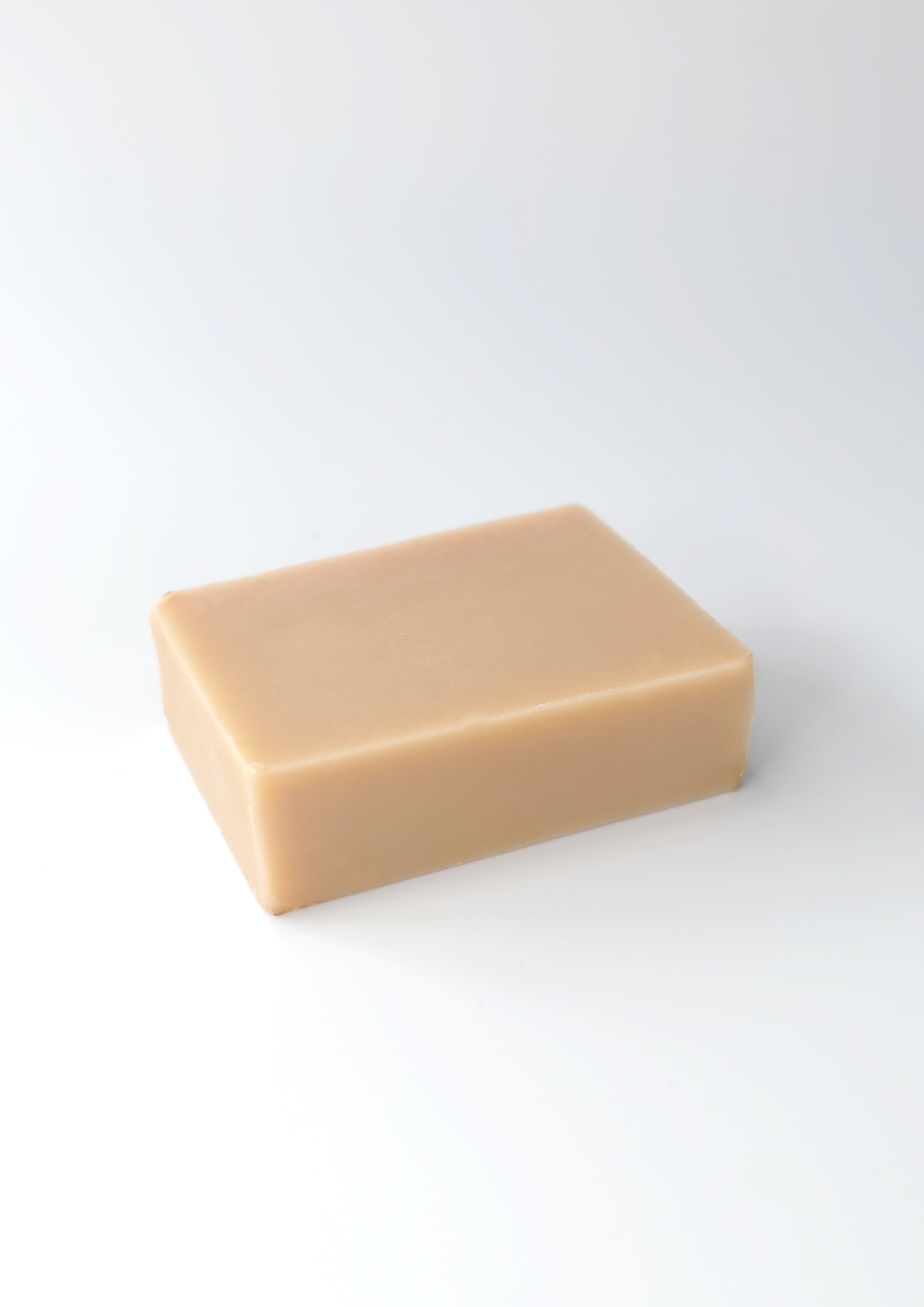 Coraline Skincare Rosy Radiance Soap. Organic soap. The pink soap bar is pictured alone on a plain white background.