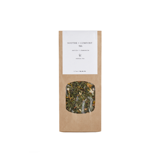 Forage Botanicals Soothe and Comfort Tea. Natural bladder relief. The loose leaf tea is pictured in a paper bag with a clear window showing the tea.