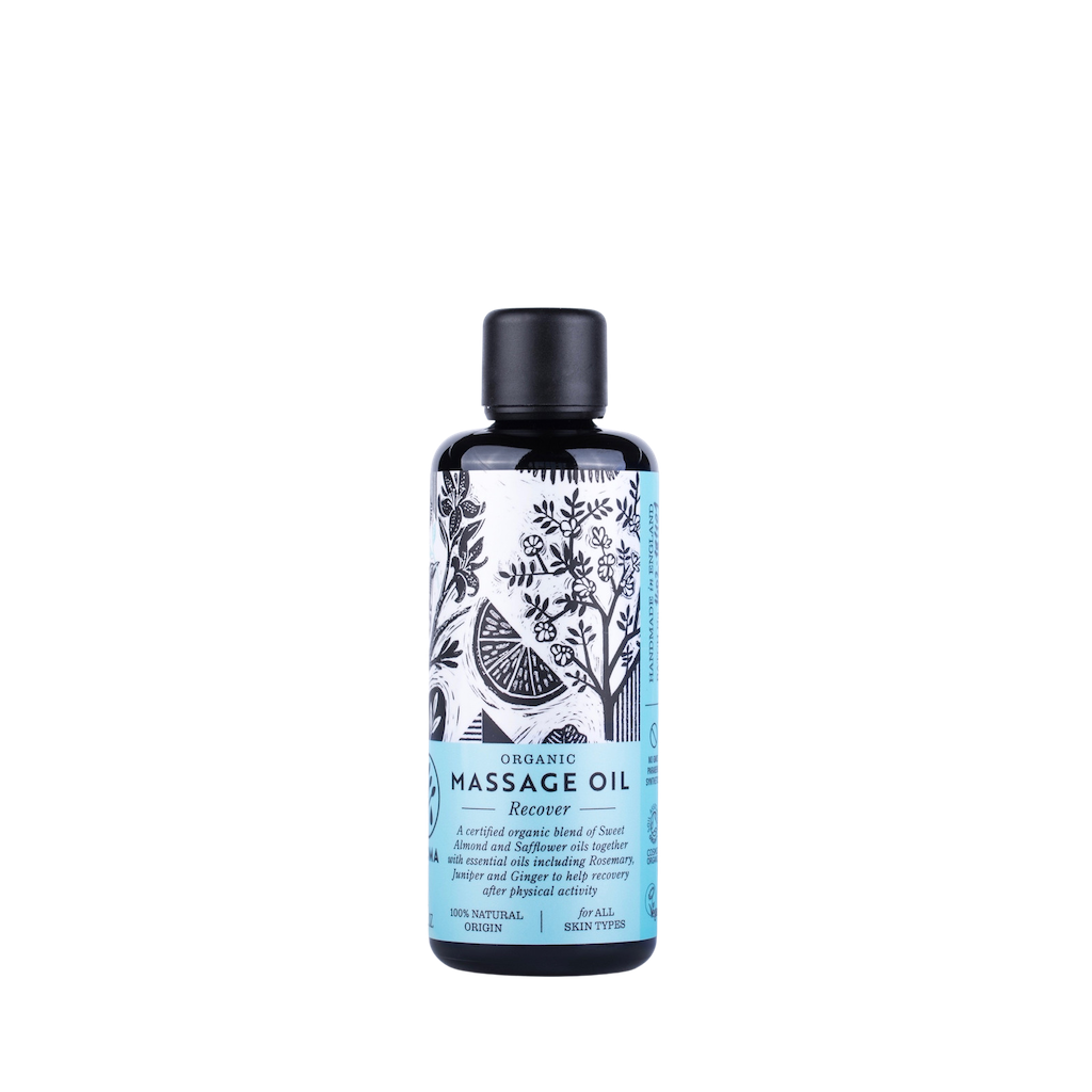 Haoma Organic Massage Oil in Recover. Organic massage oil for muscle recovery. The body oil is packaged in a black glass bottle with a blue label and black illustrations of plants.