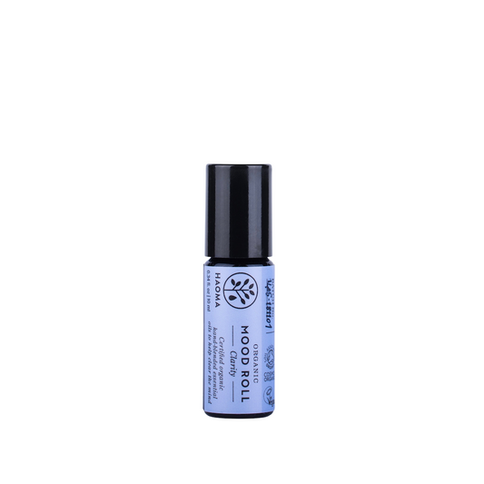 Haoma Aromatherapy Mood Roller in Clarity. Organic aromatherapy. The mood roller is packaged in a black glass bottle with a purple/blue label.