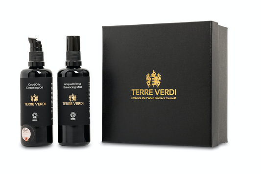 Terre Verdi Organic Cleanser Gift Set. Natural skincare gift set. Both products are in black bottles and stand next to a luxury black box embossed in gold with the Terre Verdi logo.