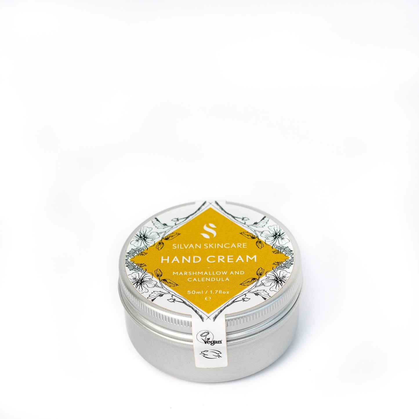 silvan skincare hand cream on a white background. the hand cream is in an aluminium pot with a white and yellow labels which reads: silvan skincare hand cream marshmallow and calendula 50ml