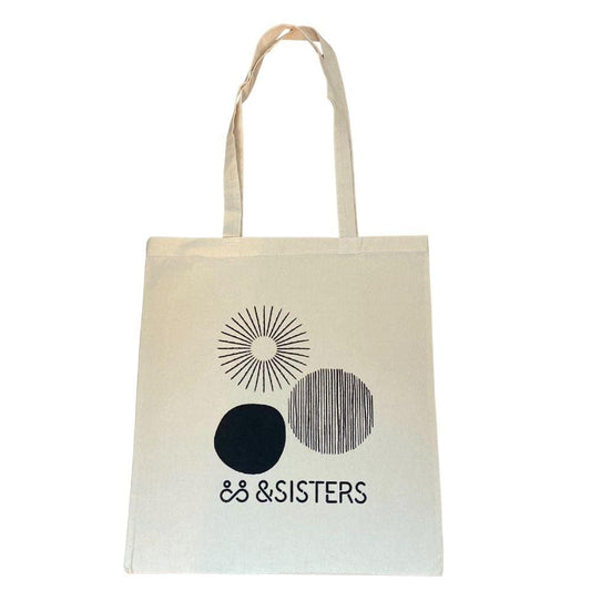 &Sisters Organic Cotton Tote Bag. White with black circle design and &sisters logo